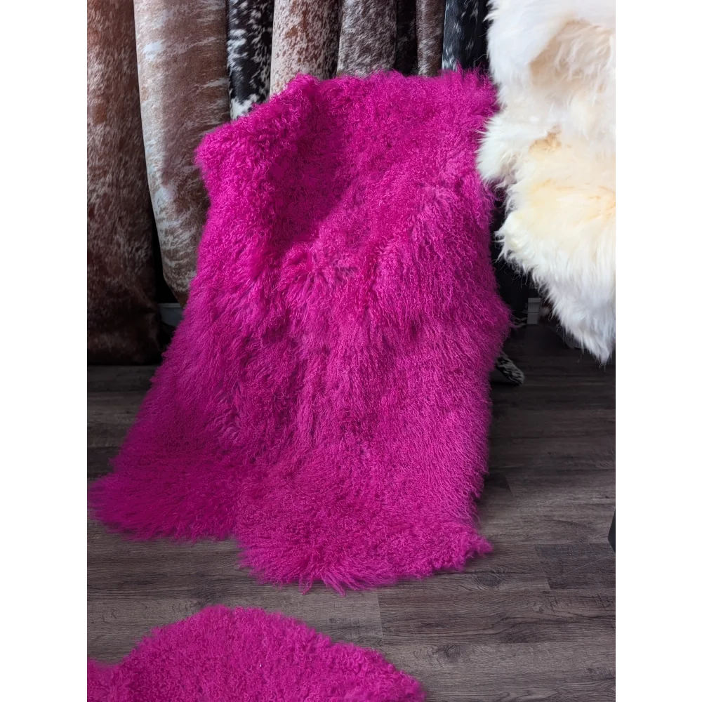 Vibrant hot pink Angus Oliver sheepskin rug, plush 64x39 fluffy texture