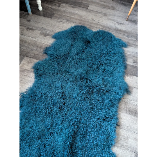 Dark teal Angus Oliver 67x40 sheepskin rug with curly texture