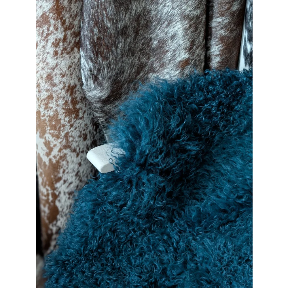 Dark teal curly sheepskin throw by Angus Oliver, 67x40 quad rug