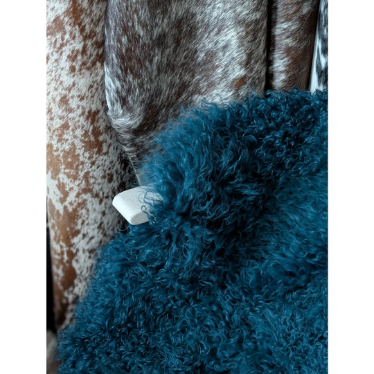 Dark teal curly sheepskin throw by Angus Oliver, 67x40 quad rug