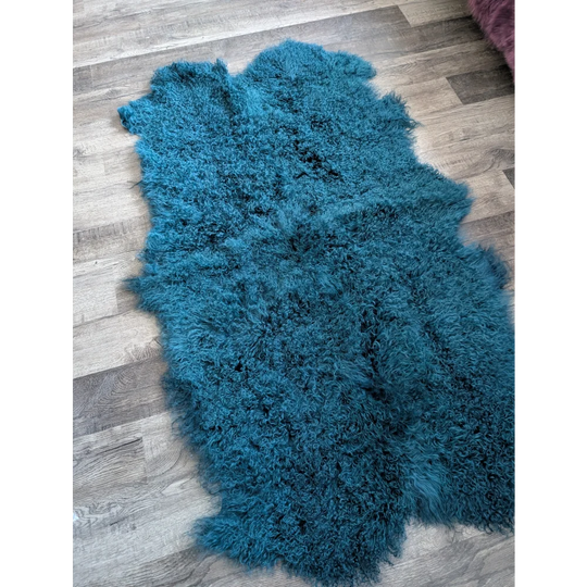 Cozy 67x40 inch dark teal Angus Oliver sheepskin rug with curly plush fur