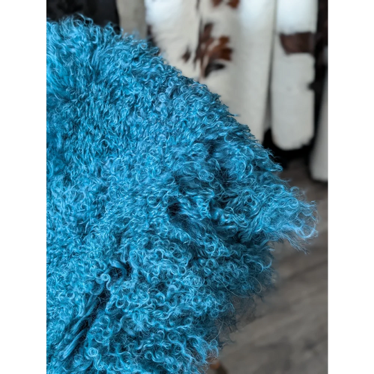 Vibrant dark teal curly sheepskin throw blanket by Angus Oliver