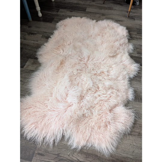 Blush pink Angus Oliver sheepskin rug, fluffy 69x43 inch quad size