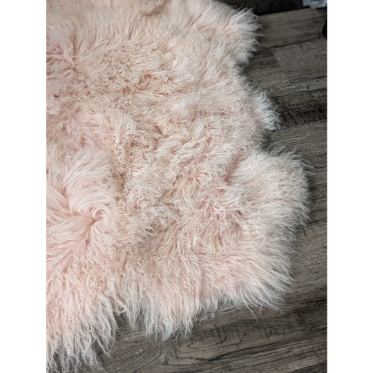 Blush pink Angus Oliver sheepskin rug, plush curly 69x43 inches