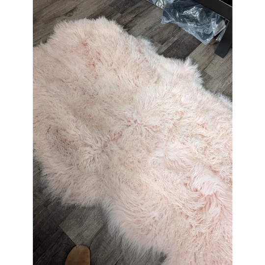 Blush pink Angus Oliver sheepskin rug, fluffy 69x43 inch