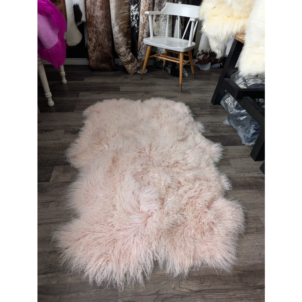 Blush pink Angus Oliver sheepskin rug, 69x43 fluffy quad size