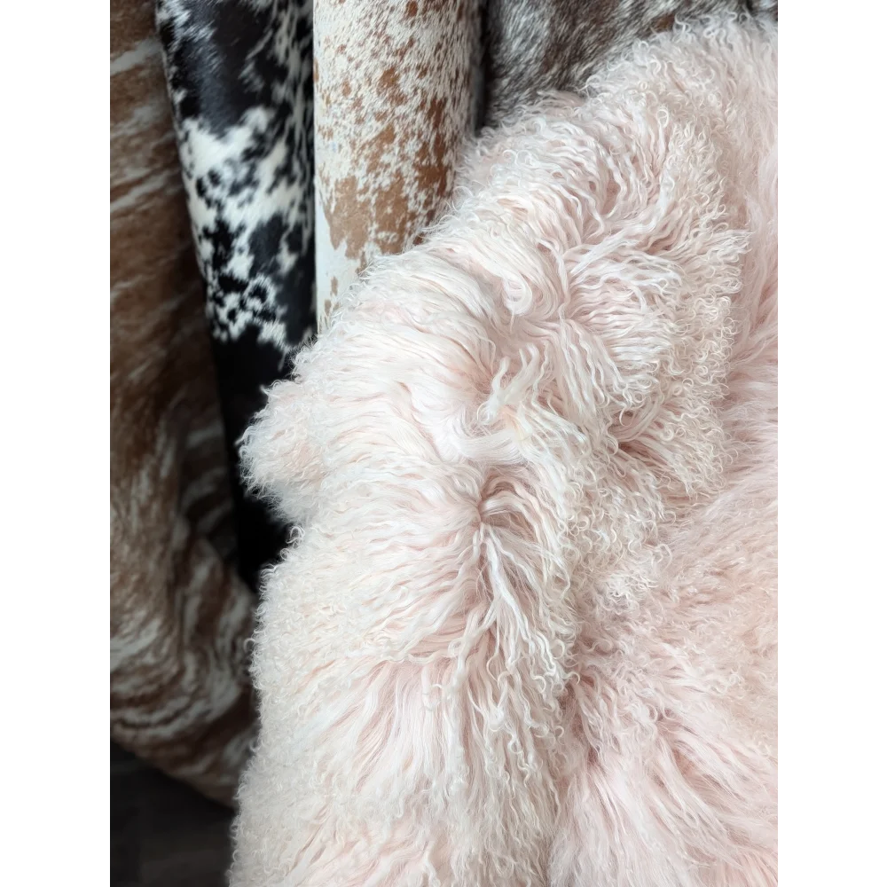 Blush pink Angus Oliver sheepskin rug, 69x43 fluffy quad sized