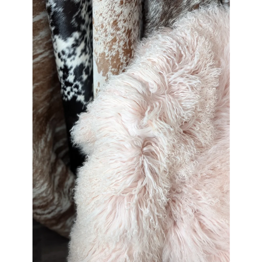 Blush pink Angus Oliver sheepskin rug, 69x43 fluffy quad sized