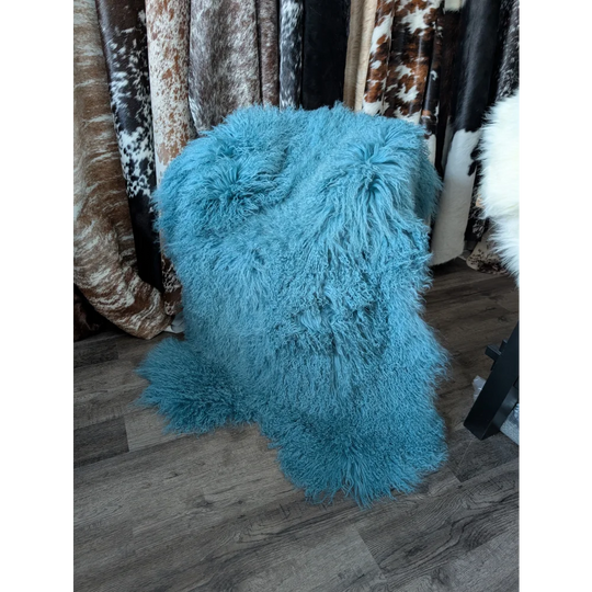 Gorgeous 71x49 aqua Mongolian sheepskin rug with fluffy turquoise fibers