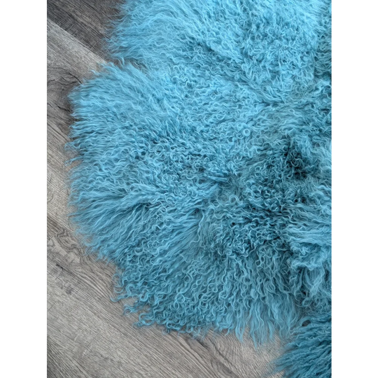 Gorgeous 71x49in aqua Mongolian sheepskin rug with curly plush fur