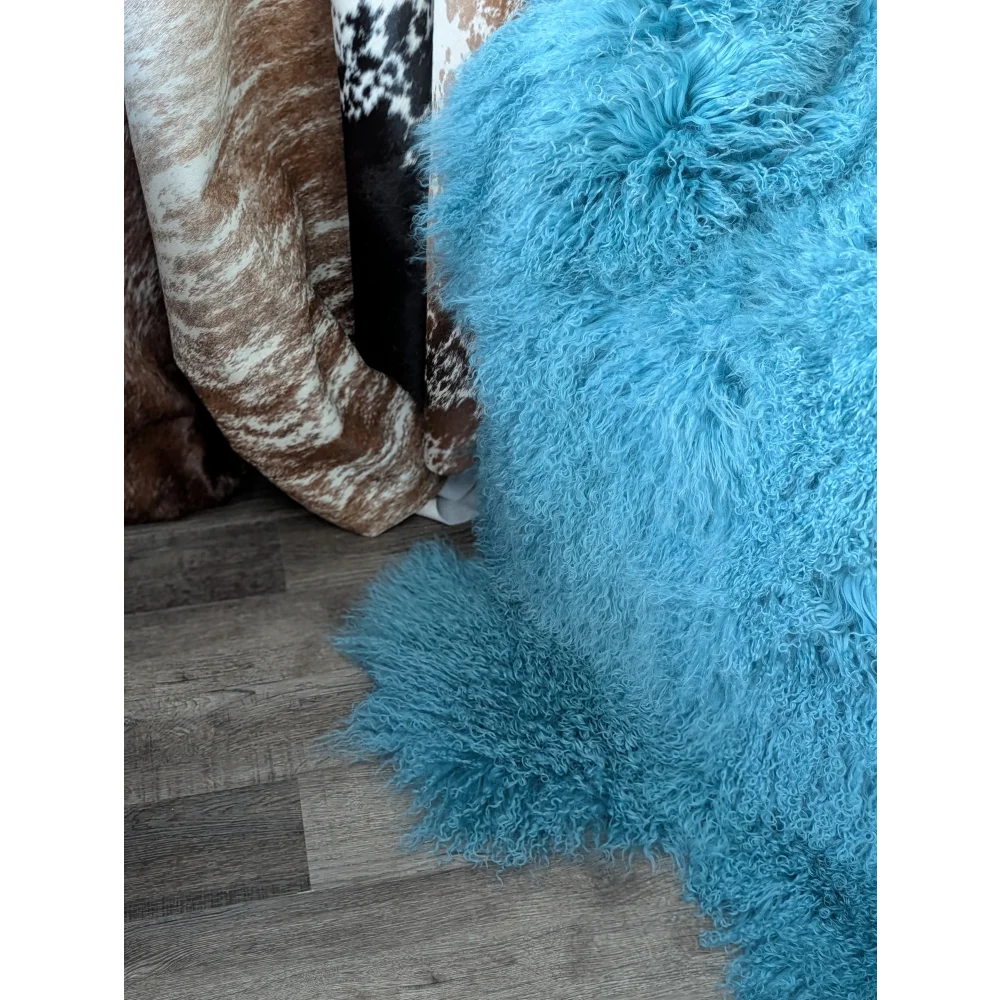 Vibrant turquoise 71x49in plush Mongolian sheepskin rug for natural home decor