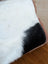 Oakley bag with a plush two-toned real cowhide cushion in soft white and black fur with a pinkish edge