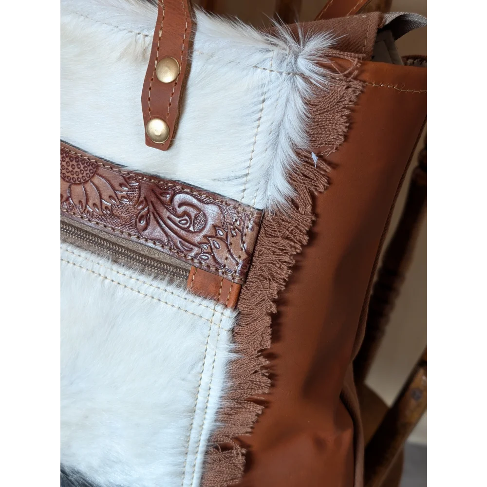 #1 oakley bag with brown real cowhide leather strap, gold hardware, embossed floral pattern, white fur trim, spacious bag