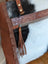 Brown leather clutch real cowhide with frayed edges floral tooled strap tassel zipper pull oakley specks canvas look