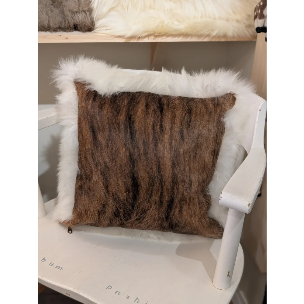 Brown faux fur throw pillow with plush white furry border made from angus oliver merino sheepskin canada