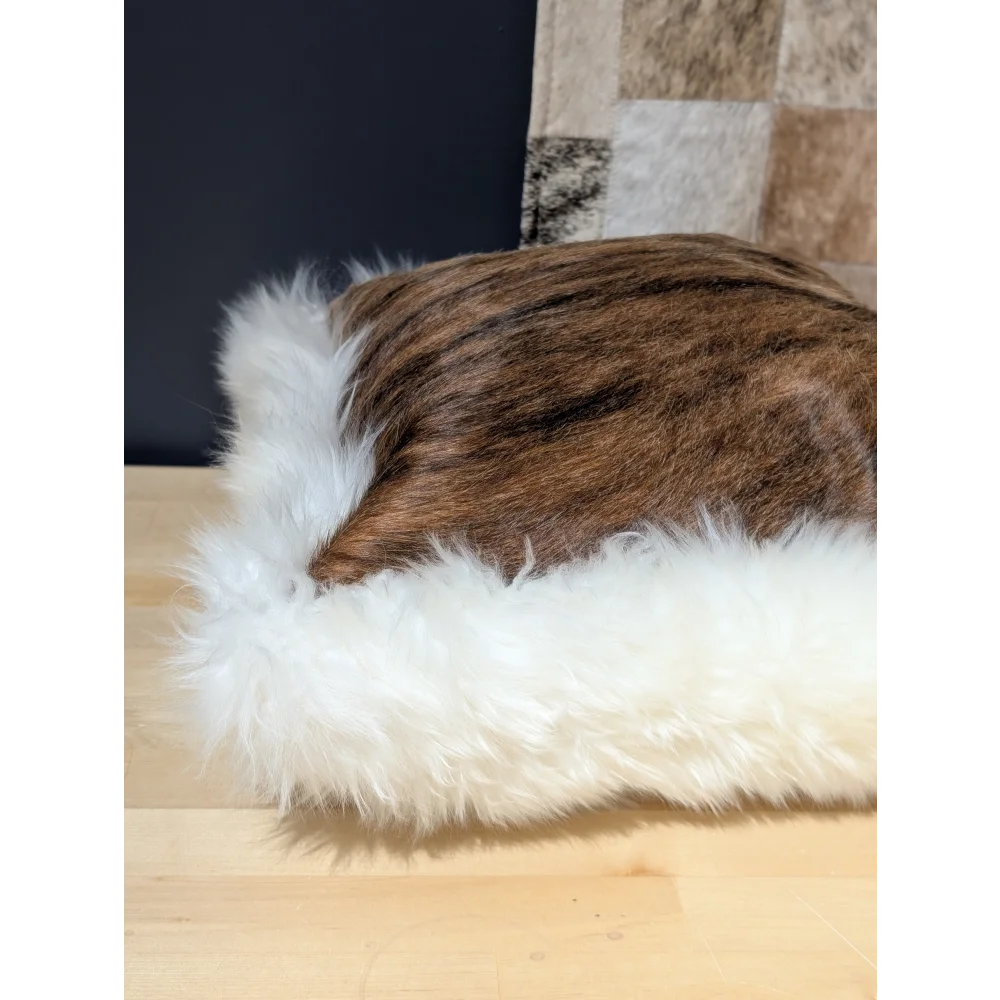 A plush brown and white merino sheepskin cat bed with soft faux fur cushion by angus oliver canada