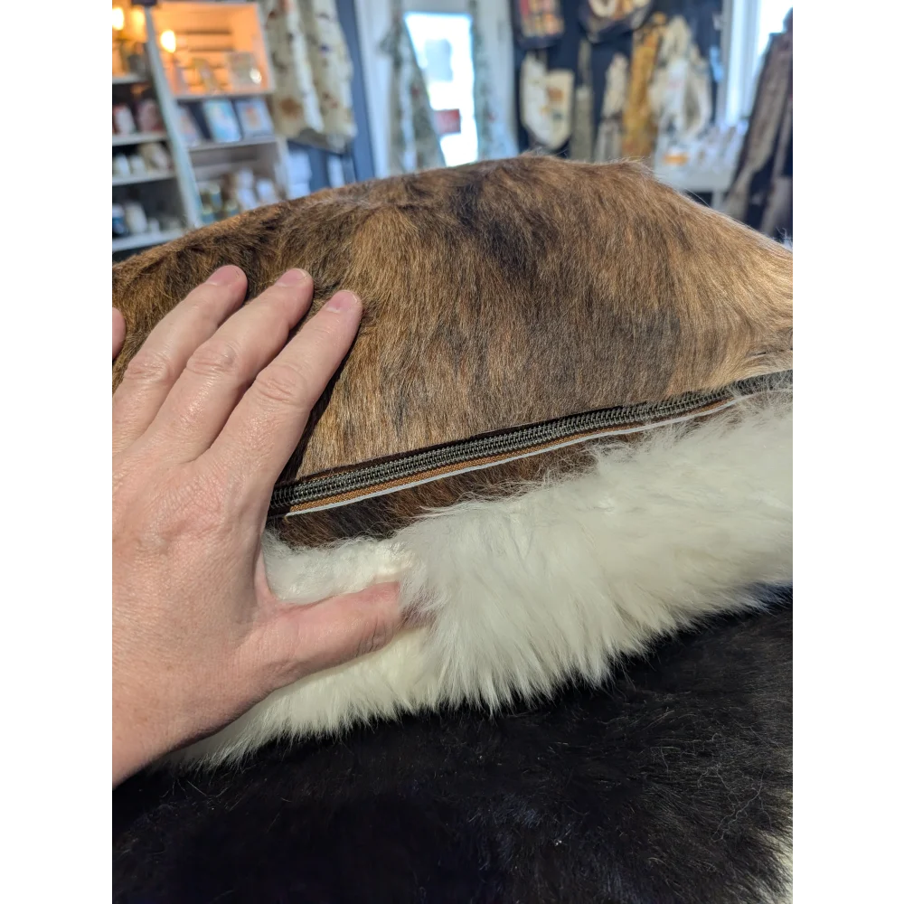 Brown and white merino sheepskin pillow with side zipper from angus oliver canada one of a kind cushion