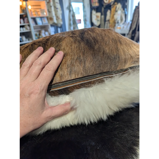 Brown and white merino sheepskin pillow with side zipper from angus oliver canada one of a kind cushion
