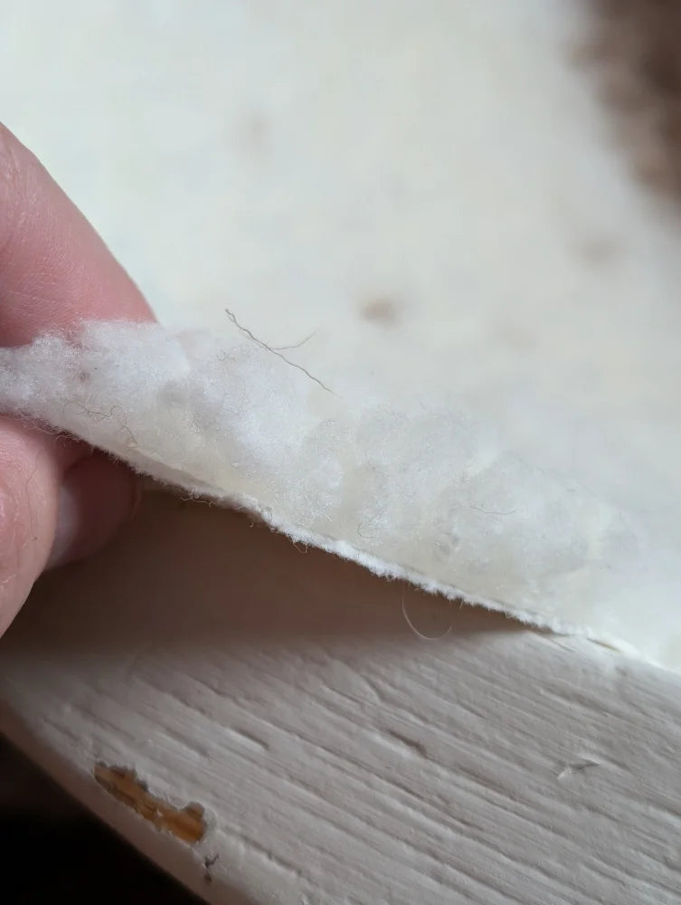 White fluffy grade a- sheepskins with soft texture and frayed edge from highland spotted sheepskin product