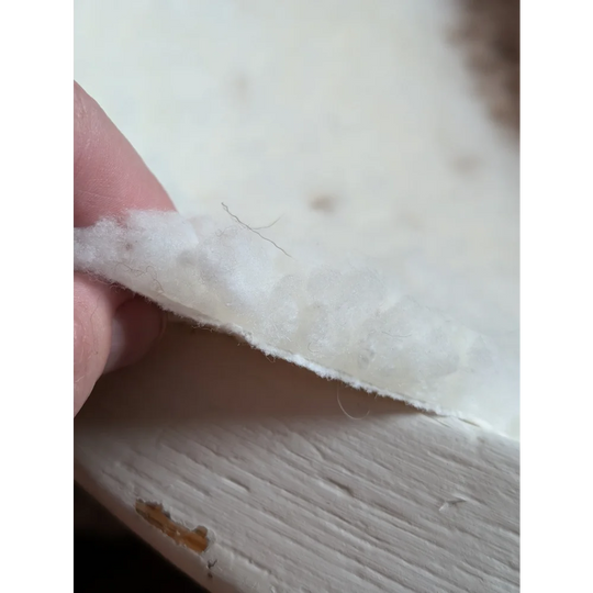 White fluffy grade a- sheepskins with soft texture and frayed edge from highland spotted sheepskin product