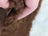 A soft fluffy brown faux fur trim on a grade a- highland spotted sheepskin #11 tibet highland spotted product
