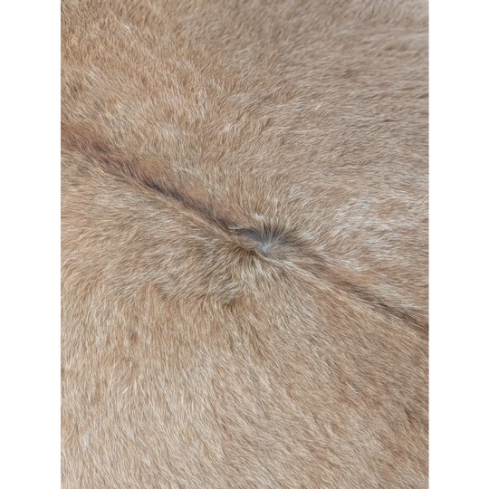Tan faux fur extra large cowhide rug with soft dense texture and natural shade variations for rustic charm beautiful rugs