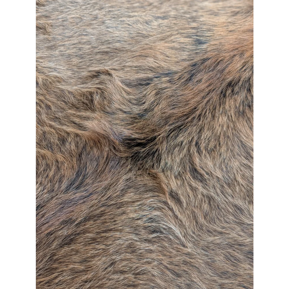 Brown and gray extra large cowhide rug with natural textured fur pattern adds rustic charm to beautiful rugs