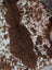Brown and white cow-print faux fur grade b sheepskin rug highland spotted perfect for cozy home decor