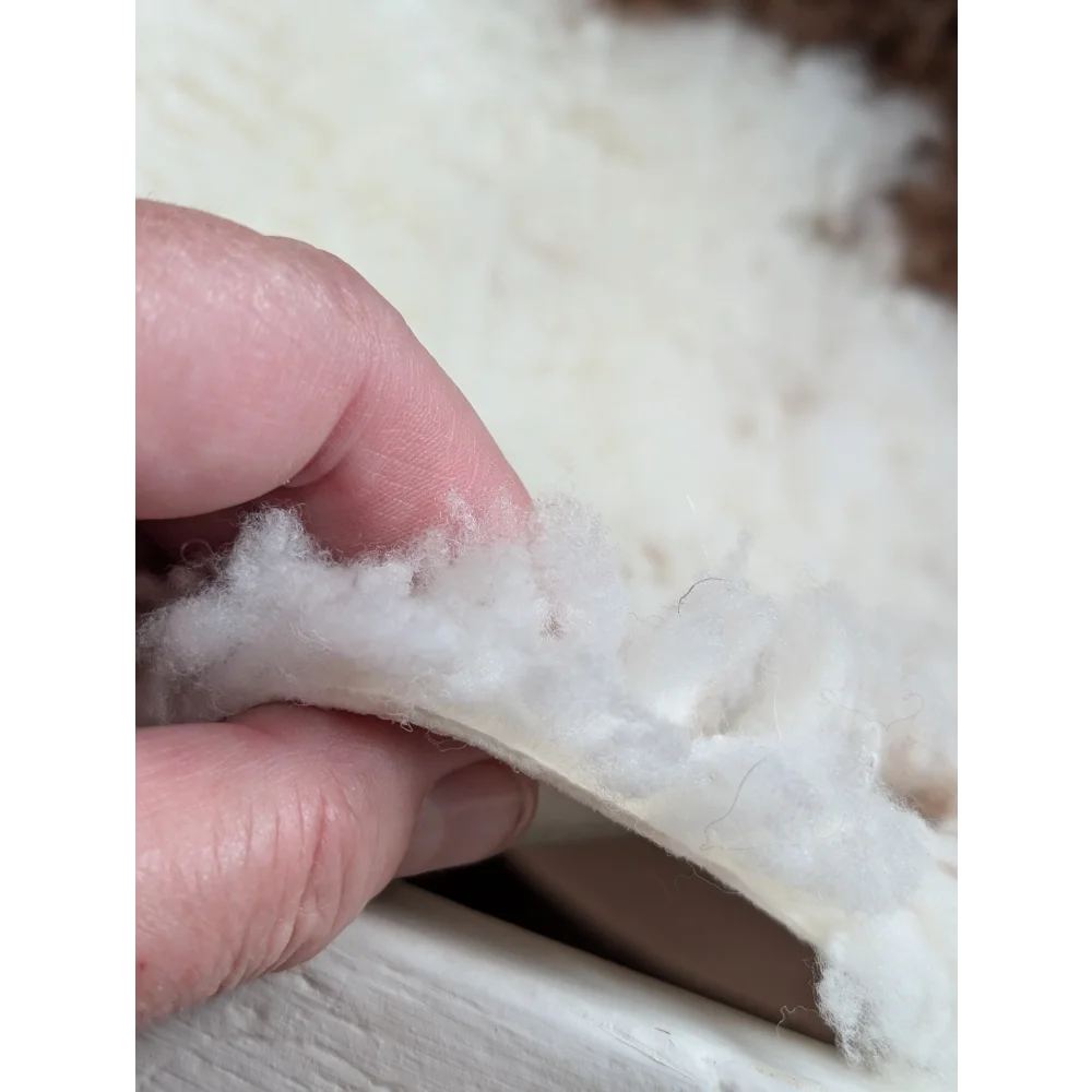 White fluffy grade a- sheepskins with soft plush lining from highland spotted sheepskin product grade a-