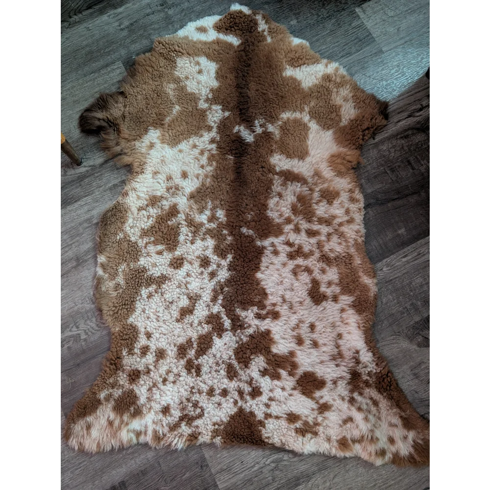 Brown and white speckled grade a- sheepskin rug with soft fluffy texture highland spotted sheepskin from tibet highland