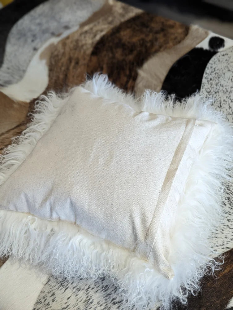 White fluffy Mongolian sheepskin cushion cover with fringed edges
