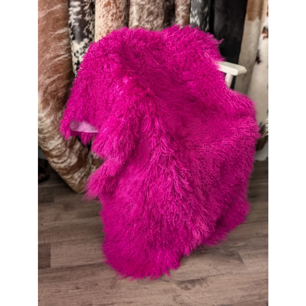 Vibrant hot pink Angus Oliver sheepskin throw blanket, ultra-soft 65x42 rug
