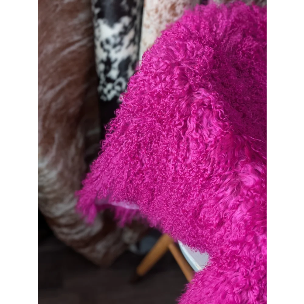 Vibrant hot pink curly sheepskin throw blanket by Angus Oliver, 65x42 inches