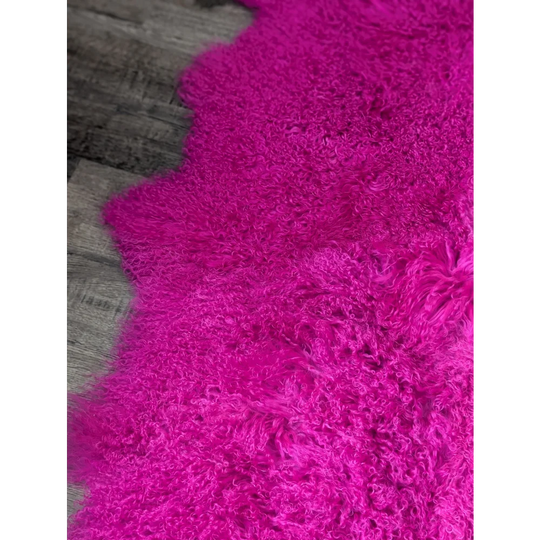 Vibrant hot pink Angus Oliver sheepskin rug, 65x42 plush curly fuchsia fur