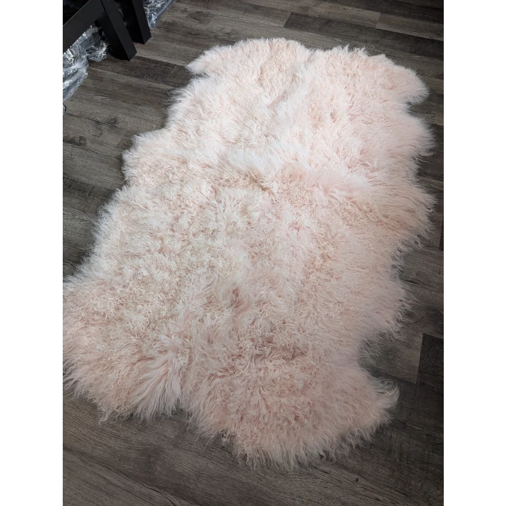 Blush pink Angus Oliver sheepskin rug, 68x45 fluffy Mongolian style