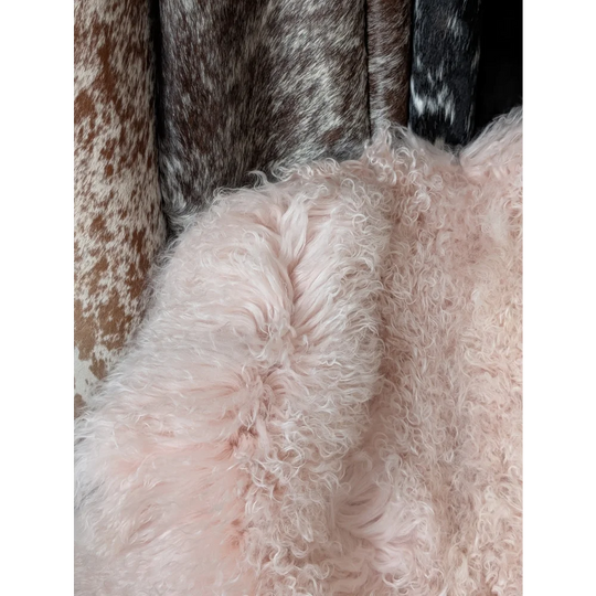 Blush pink fluffy sheepskin throw, 68x45 quad sized rug