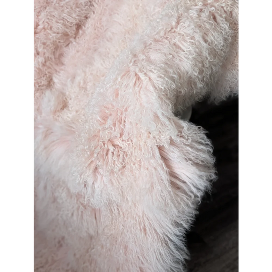 Blush pink Angus Oliver sheepskin rug, soft fluffy curly texture 68x45in