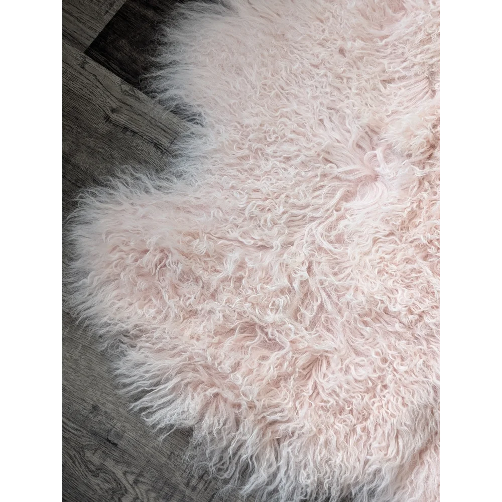 Blush pink Angus Oliver sheepskin rug, soft fluffy curly texture 68x45