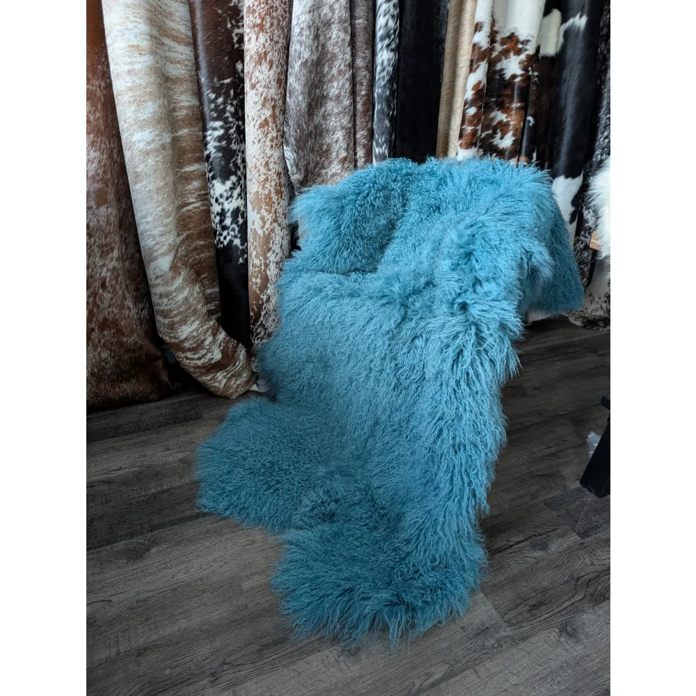 Vibrant turquoise 72x48 inch Mongolian sheepskin rug with soft fur
