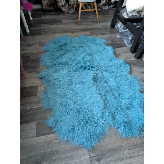 Vibrant turquoise shaggy sheepskin rug, 72x48in aqua Mongolian faux fur