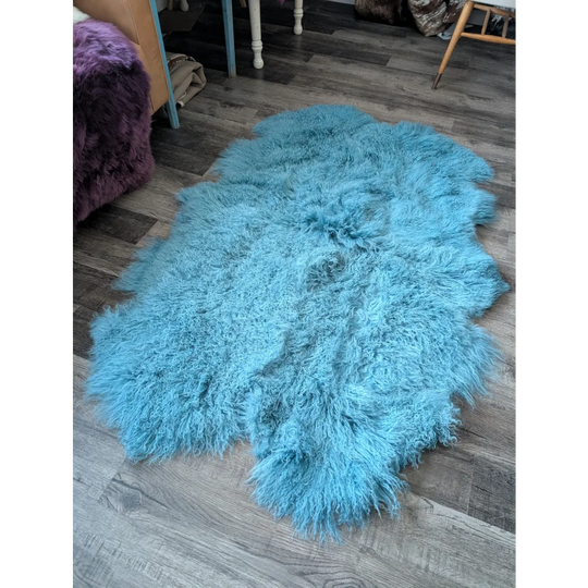 Gorgeous 72x48 aqua Mongolian sheepskin rug with fluffy curly texture