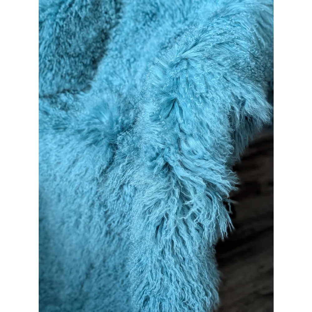 Gorgeous 72x48 aqua Mongolian sheepskin rug in plush light blue faux fur