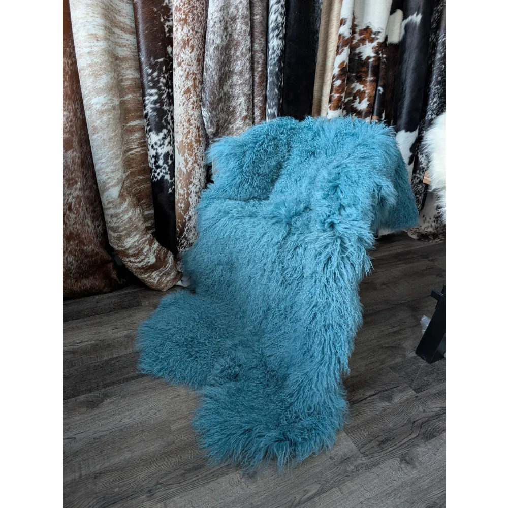Vibrant turquoise 72x48 inch Mongolian sheepskin rug for natural home decor