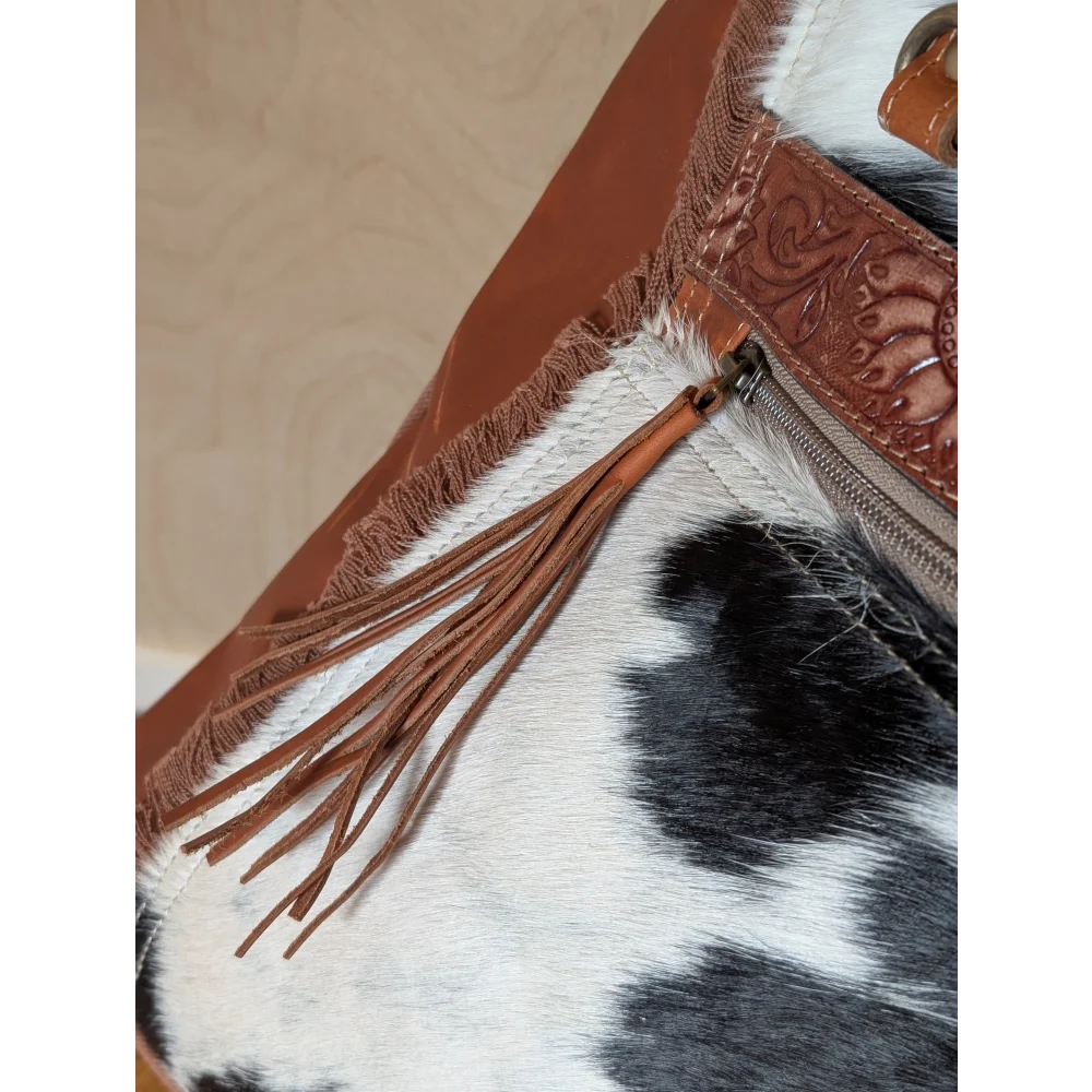 Brown leather tassel on zipper of spacious #2 oakley bag with real cowhide and embossed leather trim
