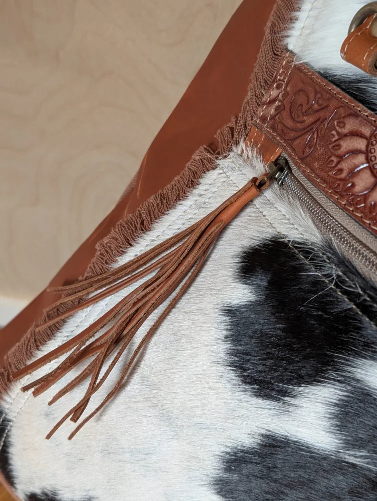 Brown leather tassel on zipper of spacious #2 oakley bag with real cowhide and embossed leather trim