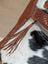 Brown leather tassel on zipper of spacious #2 oakley bag with real cowhide and embossed leather trim
