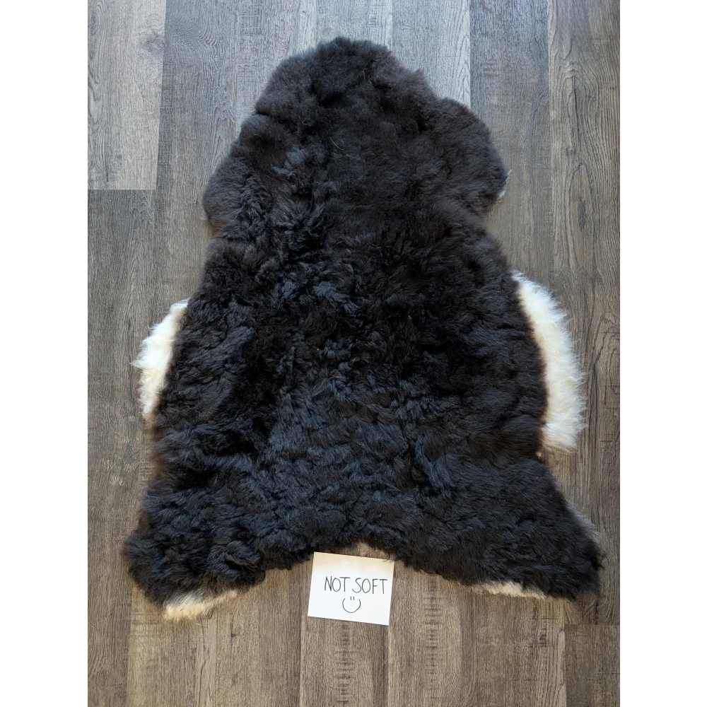 Black and white short wool white icelandic sheepskin rug with plush curly texture standard grade quality