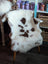 White and brown fluffy sheepskin chair cover made from grade a- tibet highland spotted sheepskins