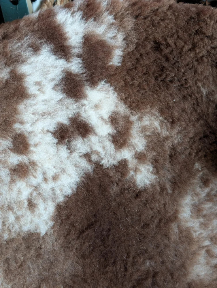 Brown and white soft fluffy tibet highland spotted sheepskin blanket grade a- with highland spotted texture