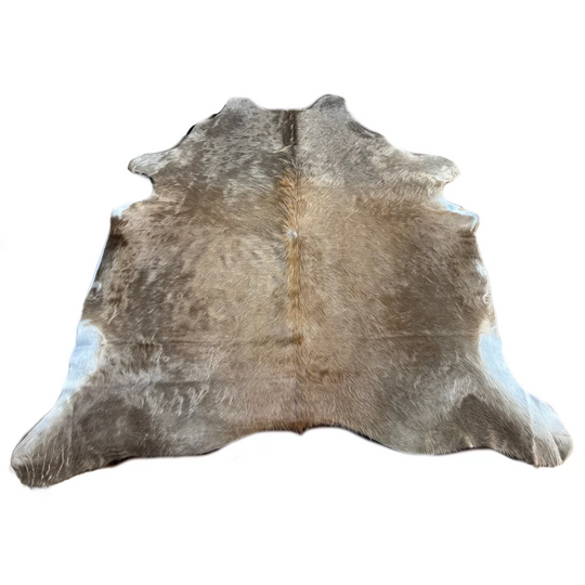 Natural brown and gray large cowhide rug with soft textured fur featuring unique characteristics for beautiful rugs